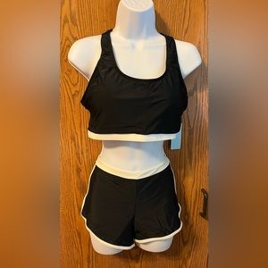Great 3 piece ladies swimsuit. Size large. NWT #P122